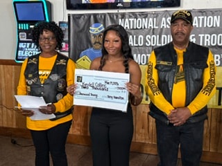 Kyndall Collins scholarship check presentation